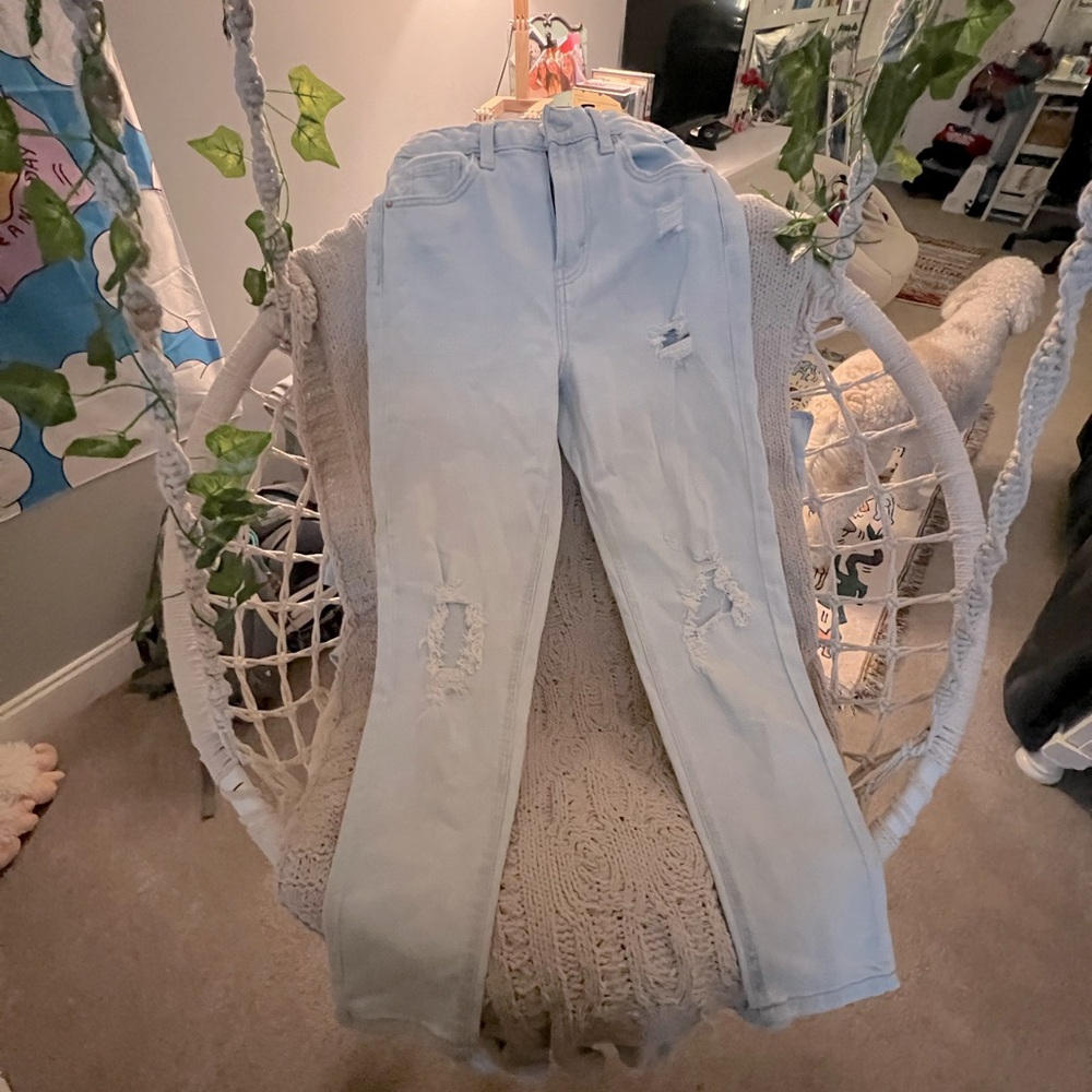 White washed straight leg jeans with holes